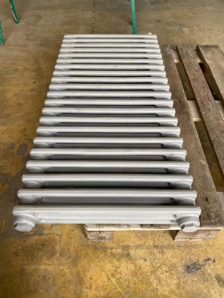 Sablage d&rsquo;un radiateur en fonte avant remise en peinture – 1260 Nyon